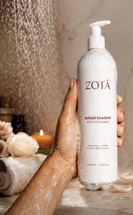 Body cleanser styled in a softly lit, elegant bathroom